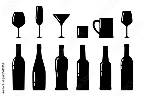 Set of bottle and glasses silhouettes,beverage containers and goblets.Alcohol drink icons collection.Simple logos.Shape basis for the design.Isolated. Vector illustration