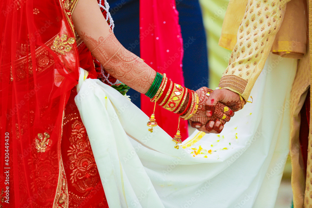Indian couple hand in wedding Satphera ceremony in hinduism