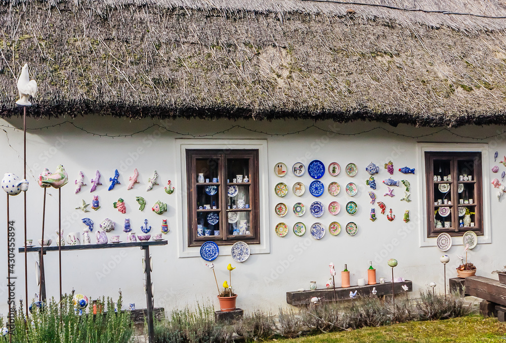 Old farmhouse with thatched roof. Cups and plates are sold, Tihany, Veszprem county, Central Transdanubia, Hungary,