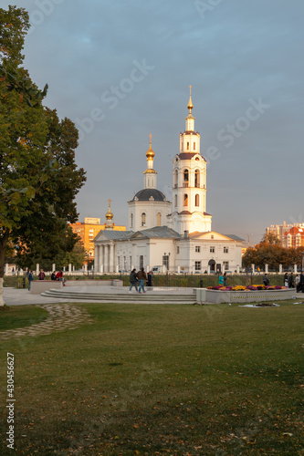 Russia, the city of Orel. The Epiphany Cathedral in the sunset light. View from the nearby park