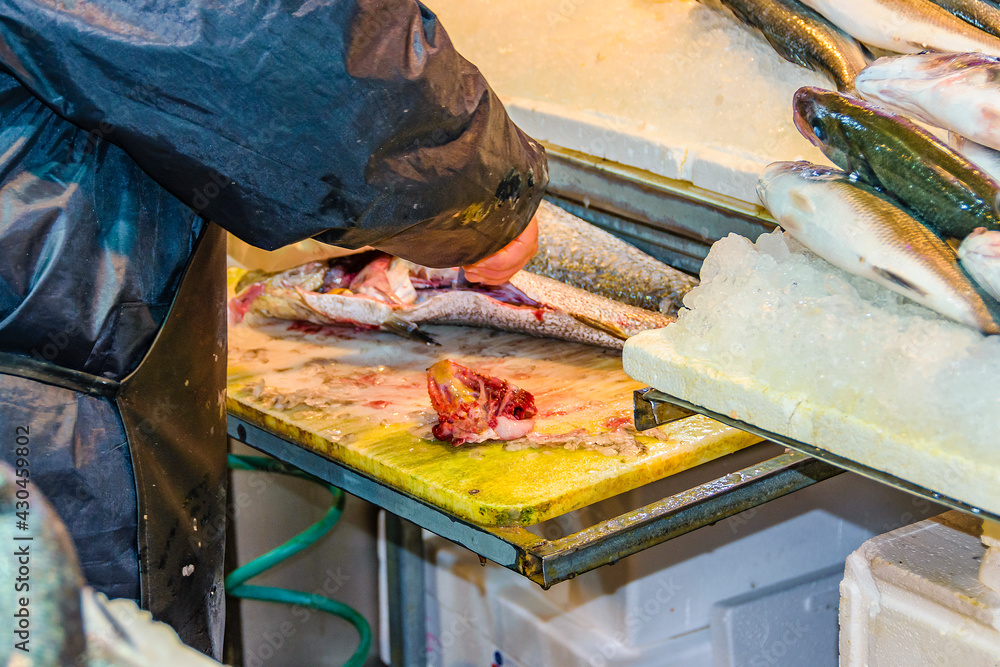 Men Cutting Fish, Dimotiki Agora Market, Athens Men Cutting Fish, Dimotiki Agora Market, Athens
