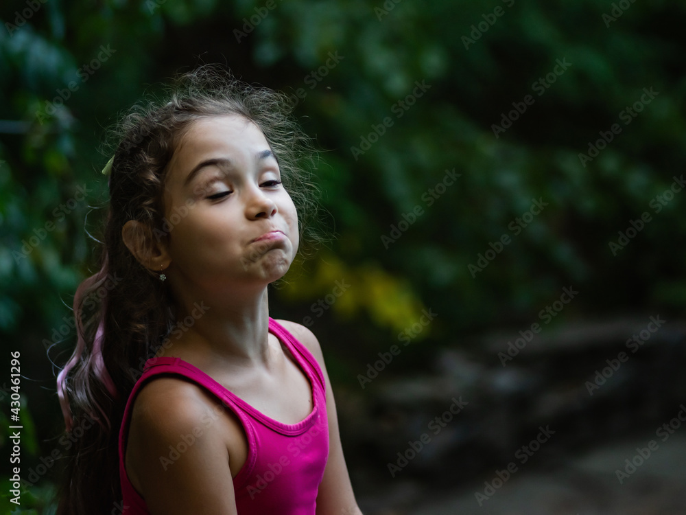 little girl pretends to be offended