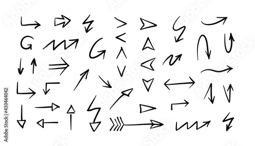 Doodle arrows. Hand drawn set in black and white colors. Scribbled arrows and pointers on white background in vector