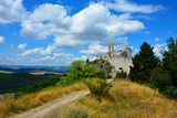 ruiny zamku na górze, castle, ruins of a castle on a hill against the blue sky