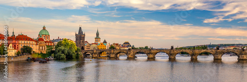 Scenic view on Vltava river and historical center of Prague, buildings and landmarks of old town, Prague, Czech Republic. Charles Bridge (Karluv Most) and Lesser Town Tower, Prague, Czechia © daliu