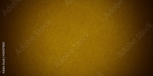 Horizontal yellow and orange grunge texture cement or concrete wall banner, blank background