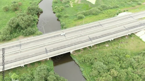 Wallpaper Mural Amazing drone view of cars riding along asphalt road over river in nature  Torontodigital.ca