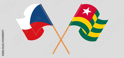 Crossed and waving flags of Czech Republic and Togo