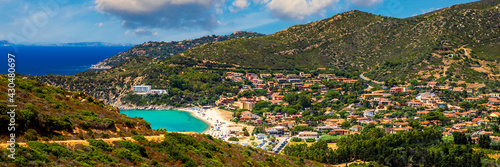 Fototapeta Naklejka Na Ścianę i Meble -  The beautiful turquoise water and white sand of Piscadeddus Beach, near Villasimius, Sardinia. The beautiful turquoise water and white sand of Piscadeddus Beach, near Villasimius, Sardinia.