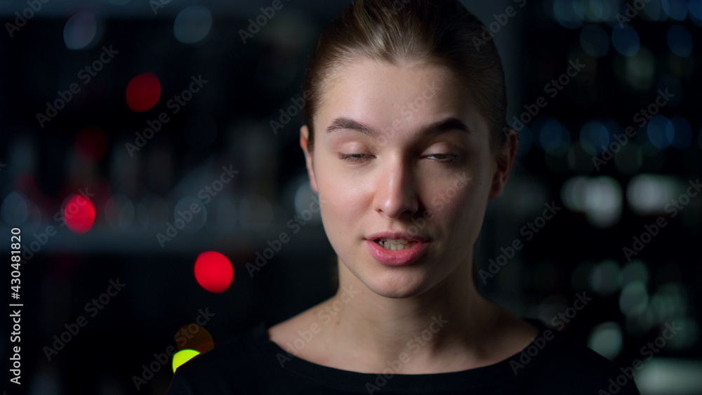 Portrait of young woman looking at web camera recording video. Video chatting. Portrait of young woman looking at web camera recording video. Video chatting.
