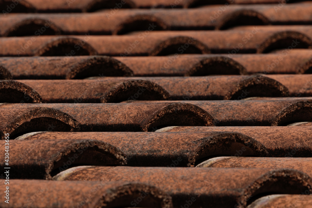 Symmetry of red roof tiles in American Southwest are beautiful architectural and cultural heritage symbols Symmetry of red roof tiles in American Southwest are beautiful architectural and cultural heritage symbols