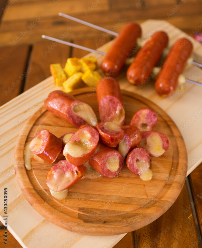 grilled sausages with melted cheese grilled sausages with melted cheese
