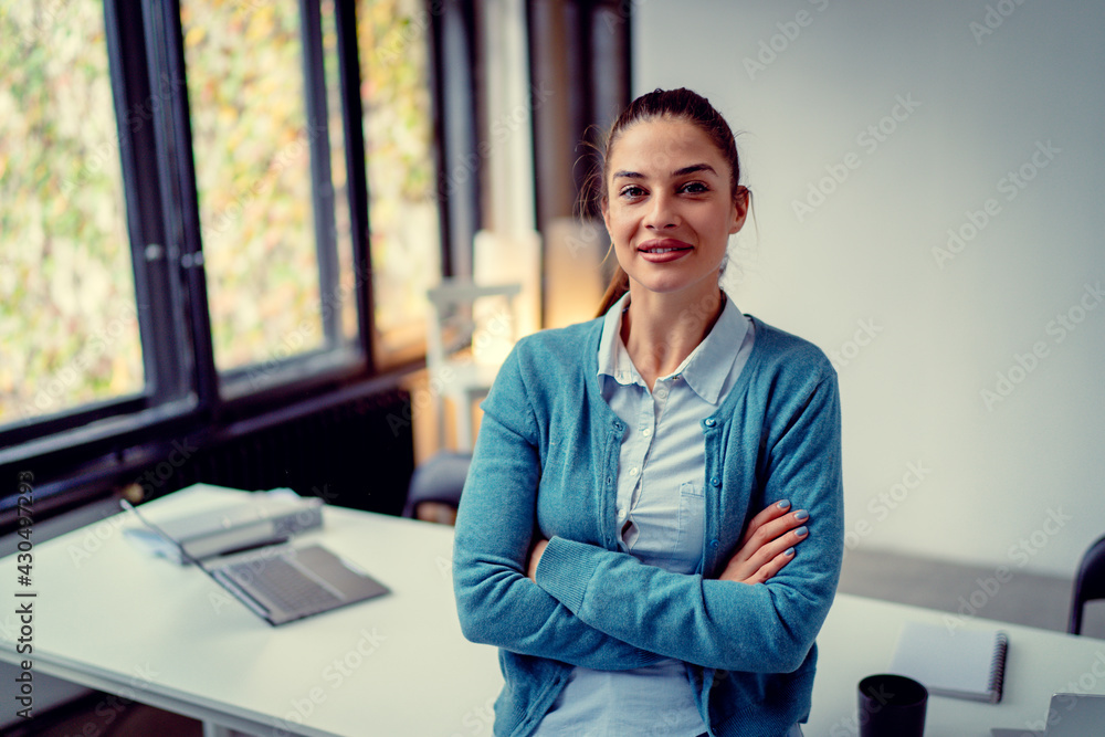 Portrait of happy young businesswoman at his office Portrait of happy young businesswoman at his office