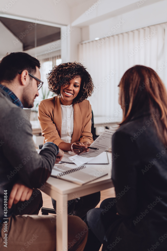 Woman having a meeting with colleagues