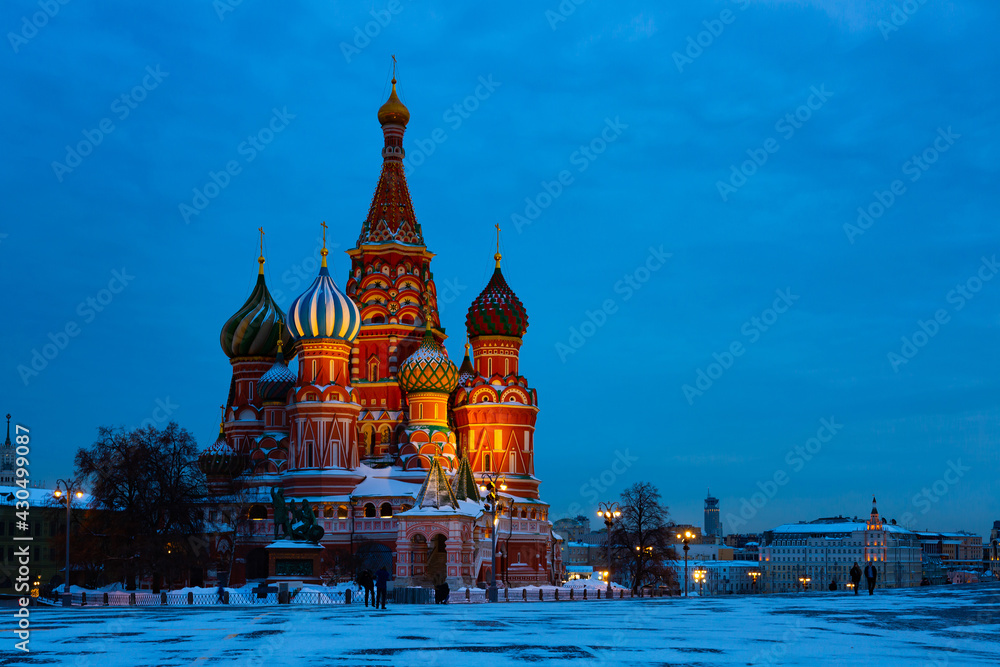 Scenic night view of famous nine domed Saint Basils Cathedral or Pokrovsky Cathedral on Red Square in Moscow. Popular cultural symbols of Russia..