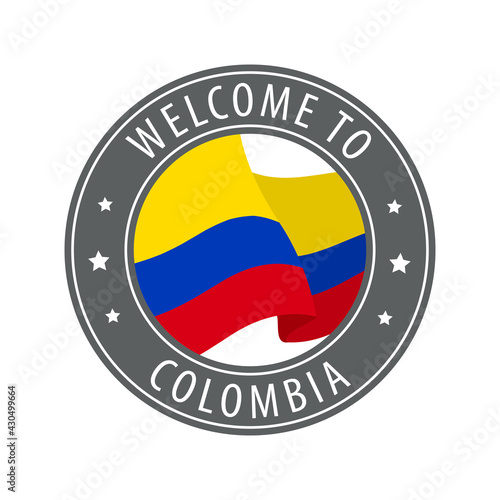 Welcome to Colombia. Gray stamp with a waving country flag.