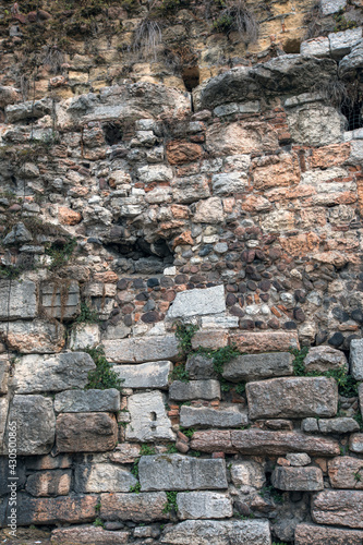 Verona, Italy, 07.04.2019: view of old ruined building in details, stone pattern