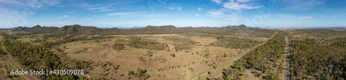 Aerial panoramic view of the Bruce Highway at Kunwarara in Queensland Australia  the view encompasses the Lake Learmouth State Forest. © Michael Evans