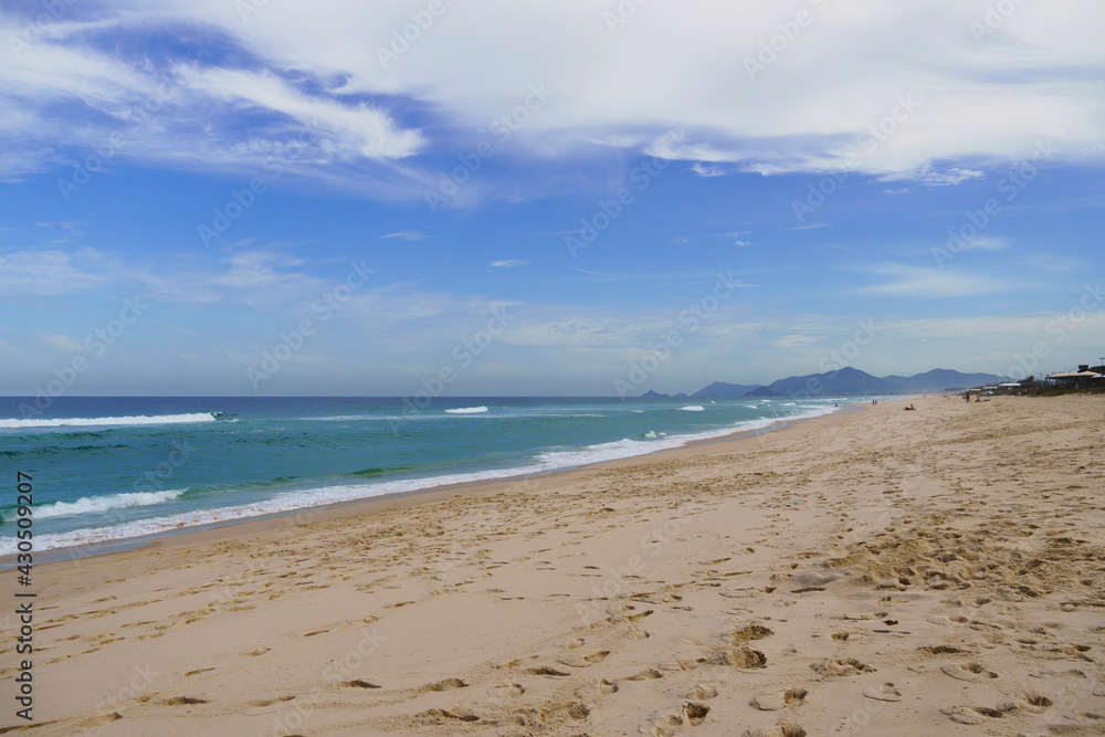 Reserva Beach, in Rio de Janeiro. Sunny day with some clouds. Empty beach.
