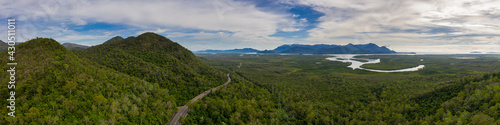 Panoramic aerial view of the Bruce Highway and Hinchinbrook Island in .Far North Queensland, Australia