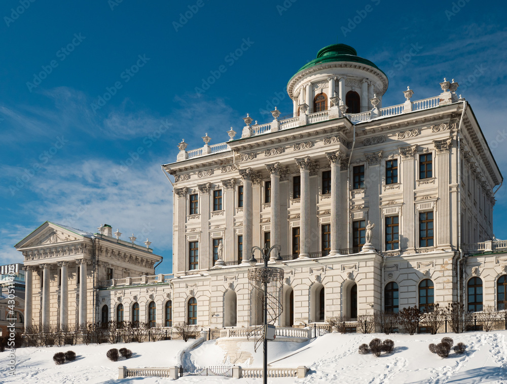 View of elegant neoclassical building of Pashkov House on Vagankovsky Hill in Moscow on sunny winter day