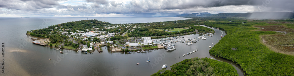 Dramatic clouds in a panoramic aerial view over Port Douglas, Far North Queensland, Australia