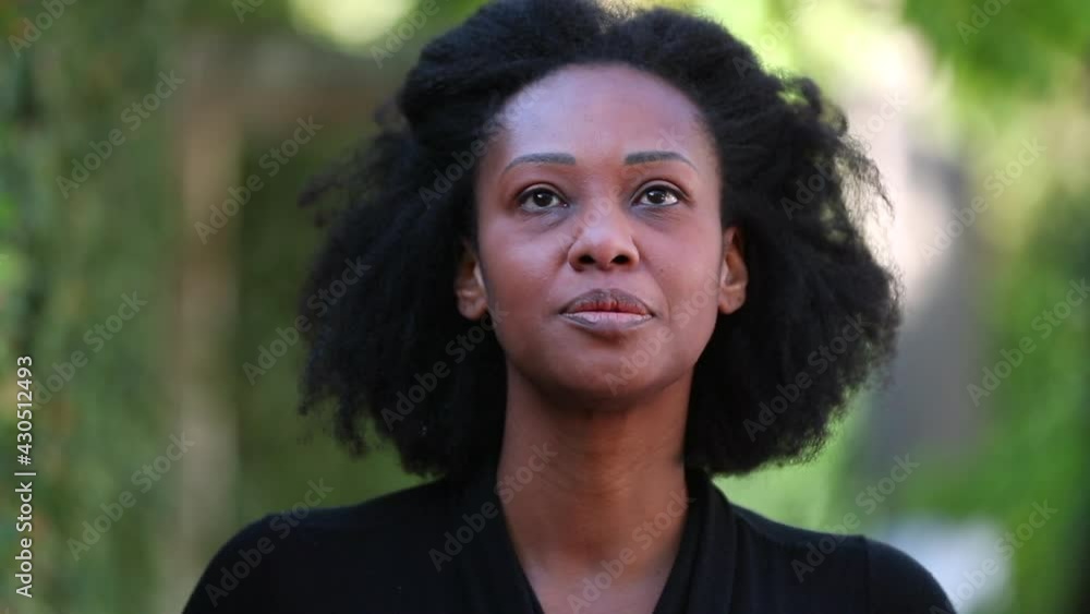 Black African woman face outside at park portrait Black African woman face outside at park portrait