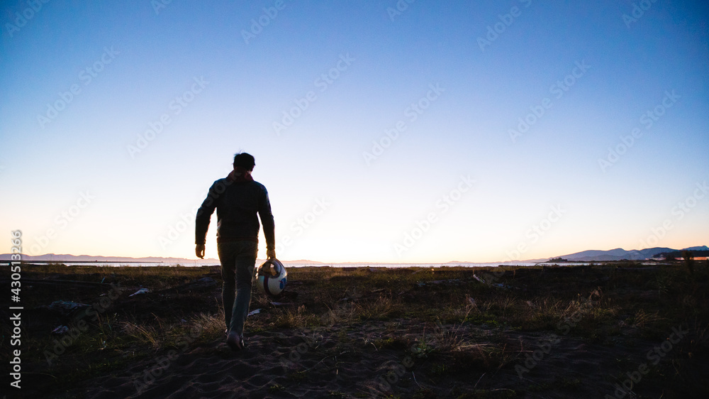 Unknown Biker walks into horizon Unknown Biker walks into horizon