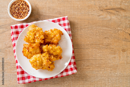 fried corn with sauce photo