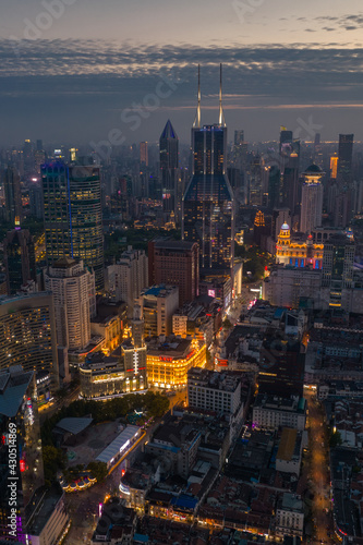 Aerial view of the skyline in Shanghai  China  at sunset.