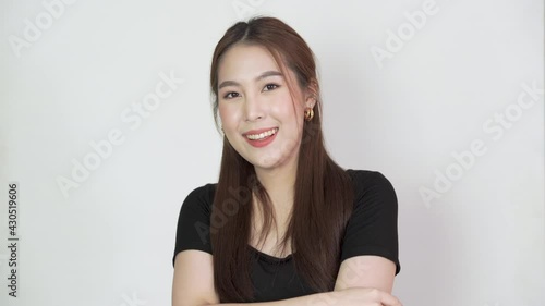 Young beautiful woman relax and show OK sing at studio