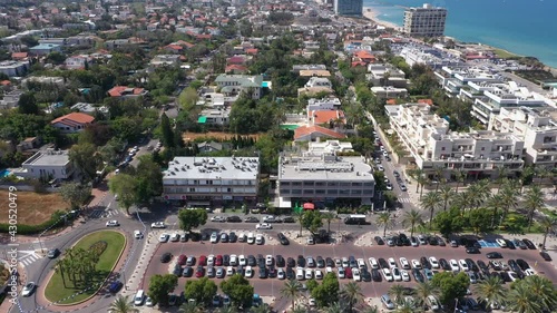 Aerial view of Herzliya coastline, with waterfront hotels and Herzliya Pituah houses. photo