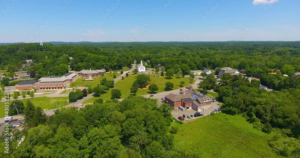 Aerial view of North Reading town center including Town Common and Public Library in summer in North Reading, Massachusetts MA, USA. Aerial view of North Reading town center including Town Common and Public Library in summer in North Reading, Massachusetts MA, USA.