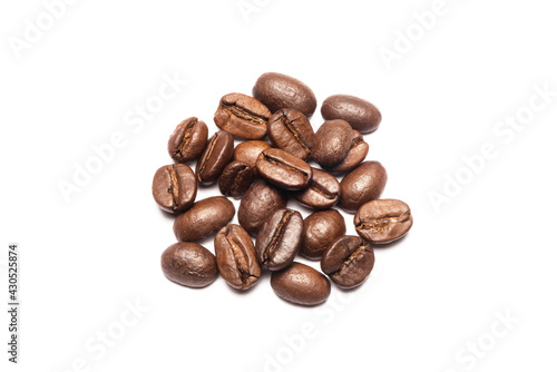 Roasted coffee beans isolated on the white background. Top view.