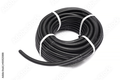 Insulating corrugated hose isolated on the white background. photo