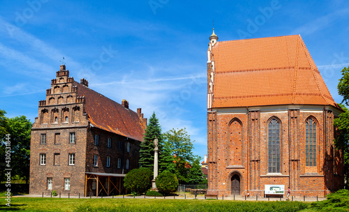 Psalmodists House and Holiest Virgin Mary Church on historic Ostrow Tumski island at Cybina river in Poznan, Poland photo