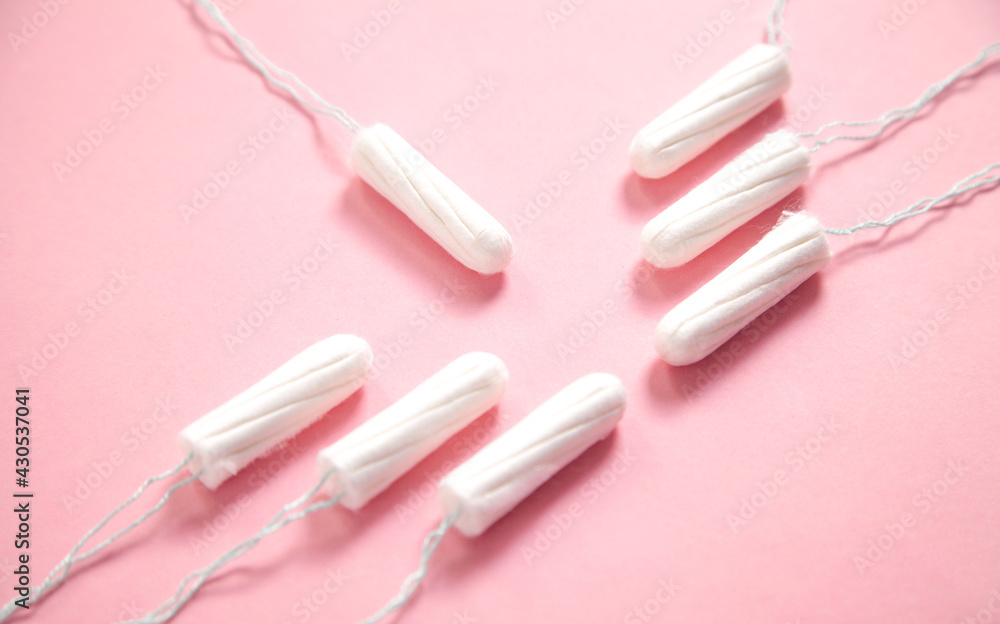 Menstrual tampon on a pink background. Menstrual tampon on a pink background.