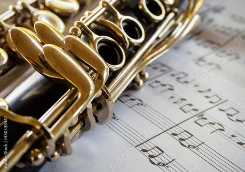 Stampa su tela clarinet with sheet music,close shot of clarinet with sheet music