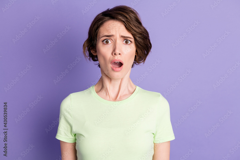 Portrait of attractive worried desperate girl bad news reaction isolated over bright violet purple color background Portrait of attractive worried desperate girl bad news reaction isolated over bright violet purple color background