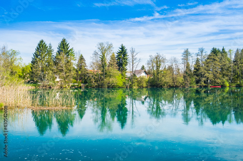 River of Mreznica in Croatia, trees reflection on water © ilijaa