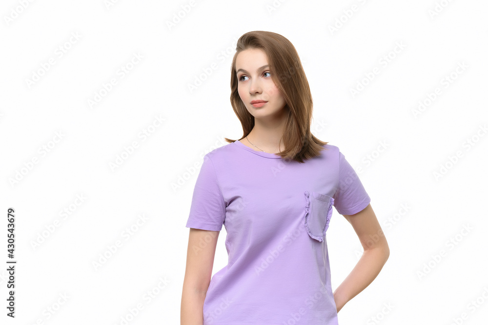 Portrait of young happy woman looking aside, wearing in casual t shirt Portrait of young happy woman looking aside, wearing in casual t shirt