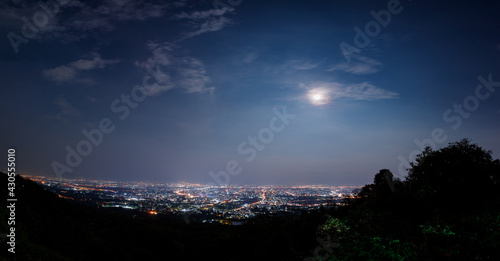 Beautiful Full Moon and Chiang Mai Cityscape At Night 