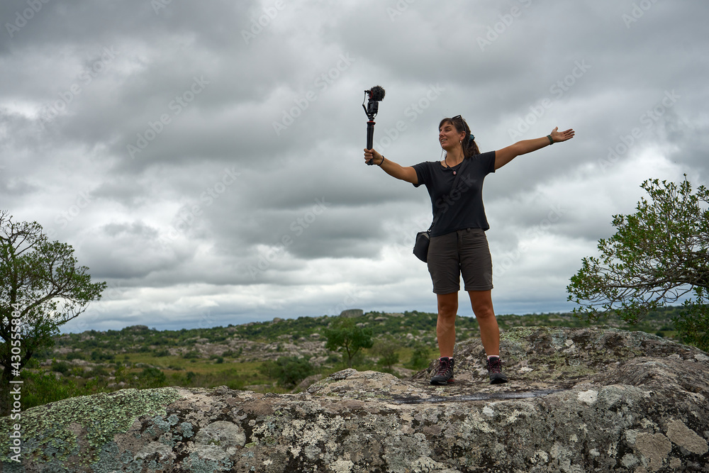 Young biology woman scientist travel and reseach kind of minerals. climber practice on rock wall survey study nature Young biology woman scientist travel and reseach kind of minerals. climber practice on rock wall survey study nature