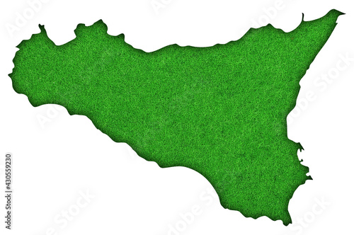 Map of Sicily on green felt