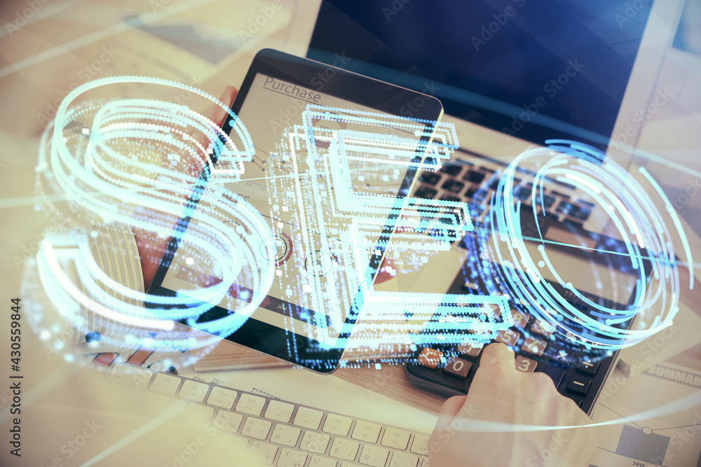Multi exposure of man's hands holding and using a digital device and seo drawing. search optimization concept. Multi exposure of man's hands holding and using a digital device and seo drawing. search optimization concept.