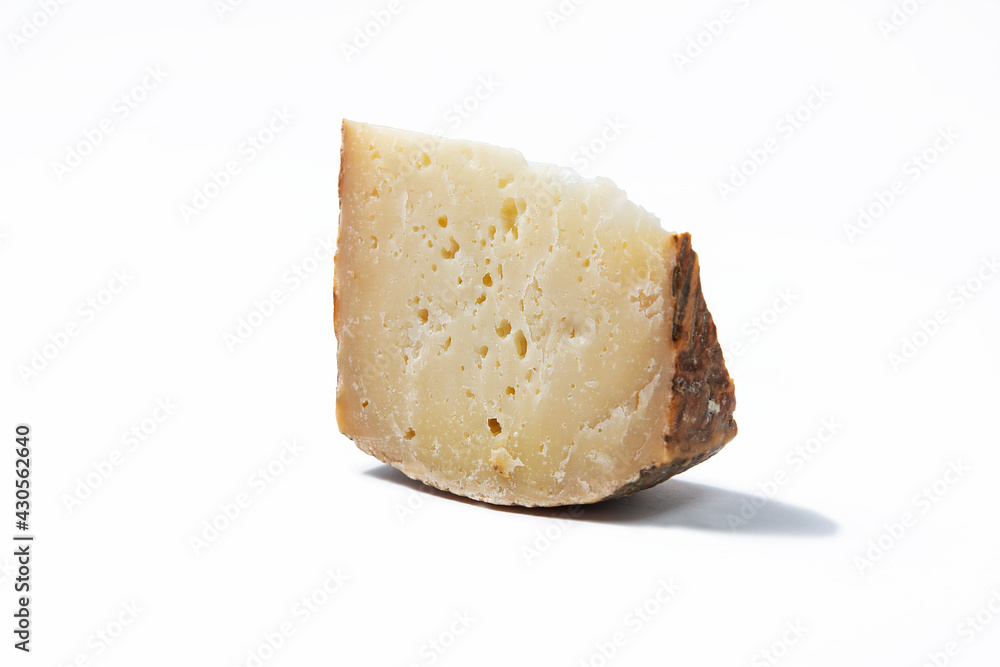 a piece of aged pecorino cheese in white background
