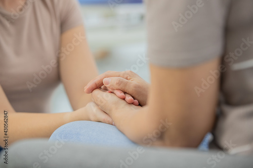 Принти на полотні Hands of women hold together in the manner of support and encouragement