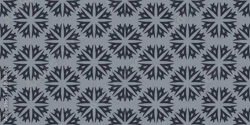 Monochrome decorative background pattern on gray background, wallpaper. Seamless pattern, texture. Vector graphics