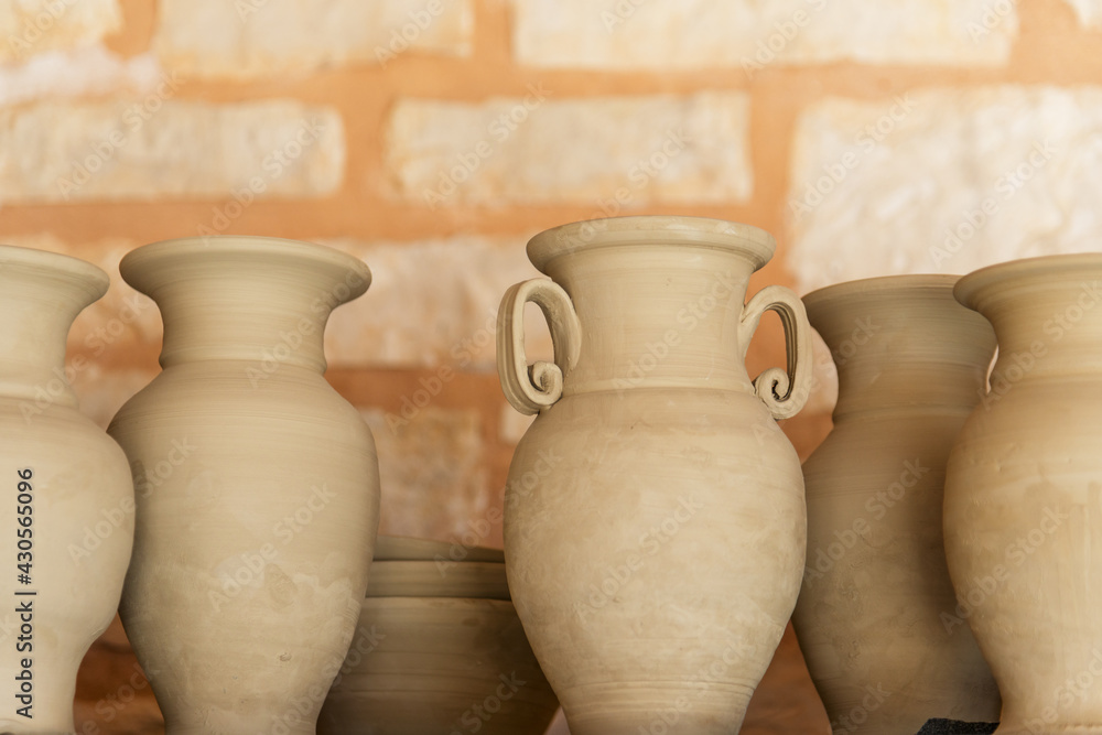 Display of traditional pottery in the colorful village of Margarites, famous for its handmade ceramic, Crete, Greece Display of traditional pottery in the colorful village of Margarites, famous for its handmade ceramic, Crete, Greece
