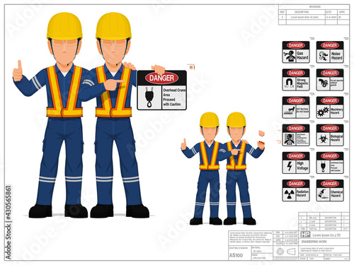 Two industrial workers are presenting warning sign on white background